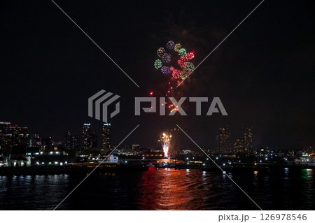 Fireworks display over Yokohama Port during a lively festival celebration at night Fireworks display over Yokohama Port during a lively festival celebration at night 126978546