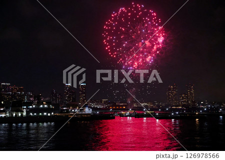 Fireworks display over Yokohama Port during a lively festival celebration at night 126978566