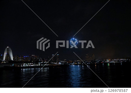 Fireworks display over Yokohama Port during a lively festival celebration at night Fireworks display over Yokohama Port during a lively festival celebration at night 126978587