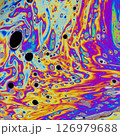 Macro photo of colourful pastel swirly patterns of a soap bubble 126979688