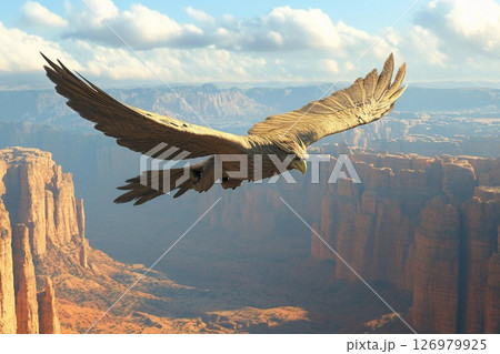 Majestic eagle soaring over a dramatic landscape with mountains and clouds 126979925