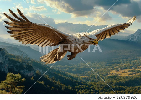 Majestic eagle soaring over a dramatic landscape with mountains and clouds 126979926