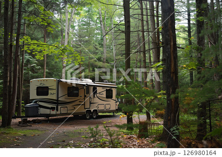 Holiday trip on large family motorhome for holiday in beautiful natural nature, abstract vivid composition consists of fictional unreal fantastic vision on background Holiday trip on large family motorhome for holiday in beautiful natural nature, abstract vivid composition consists of fictional unreal fantastic vision on background 126980164