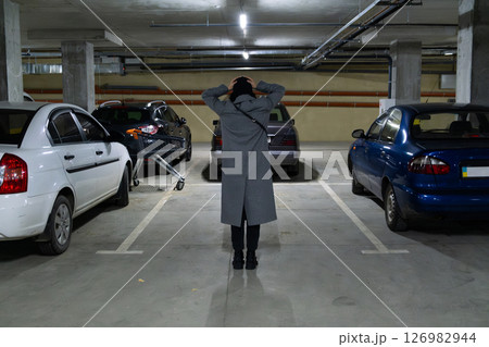 sad woman find out that her car stolen sad woman find out that her car stolen 126982944