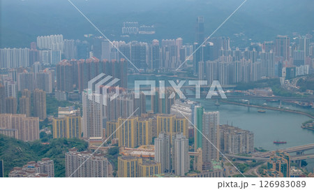 May 25 2025 Hong Kong Apartments and Industrial Port in Urban Setting 126983089