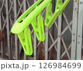 Close-up of green plastic clothes pegs 126984699