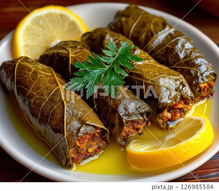 Tightly Rolled Stuffed Grape Leaves Tightly Rolled Stuffed Grape Leaves 126985584