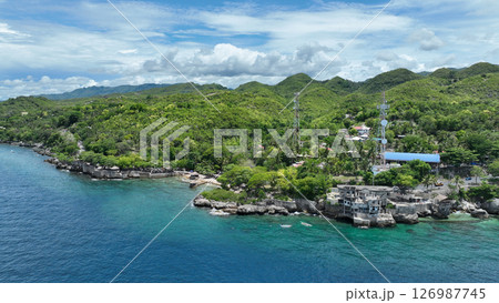 Coast beach drone Philippines Cebu aerial sea Kalubian view beautiful rock mountains pov, tourist place for recreation island and travel inshore waves, people clean water, blue sky love beauty of life 126987745