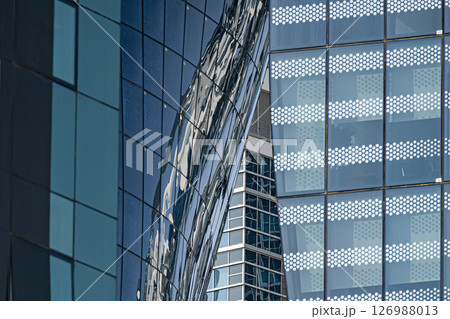 Different glass walls of buildings. Architecture details. Abstract background 126988013