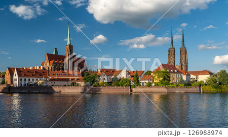 Stunning view of Collegiate Church of the Holy Cross, St Bartholomew under blue sky, Wroclaw, Poland 126988974