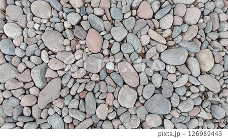 River pebbles with different textures close-up. Stone background 126989443