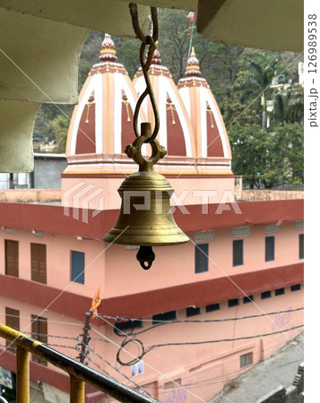 Temple Bell with Hindu Architecture in the Background, Rishikesh, India. 126989538