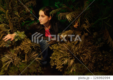 A young girl with dark hair poses as Buffy the vampire hunter 126992094