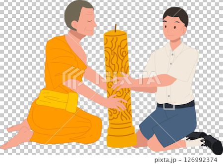 A young Thai student offers a candle to a monk during Khao Phansa at a temple 126992374