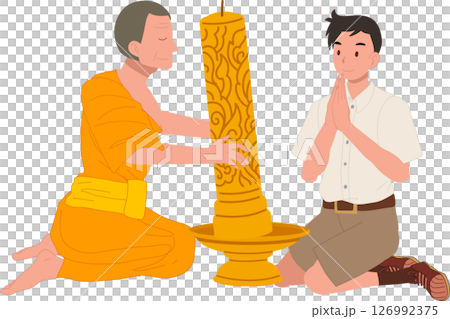 A young Thai student offers a candle to a monk during Khao Phansa at a temple 126992375