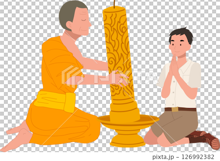 A young Thai student offers a candle to a monk during Khao Phansa at a temple 126992382