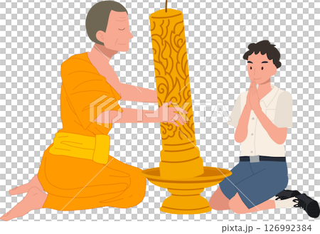 A young Thai student offers a candle to a monk during Khao Phansa at a temple 126992384