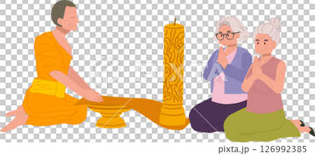 Elderly Thai woman offering candle to monk on Buddhist Lent Day. 126992385