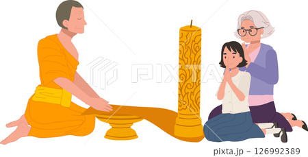 Elderly woman and grandchild offer a candle to a monk during a buddhist holiday. Buddhist Lent 126992389