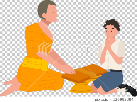 A Thai student boy offers a bathing robe to a monk during Buddhist Lent 126992394