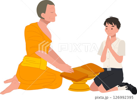 A Thai student boy offers a bathing robe to a monk during Buddhist Lent A Thai student boy offers a bathing robe to a monk during Buddhist Lent 126992395