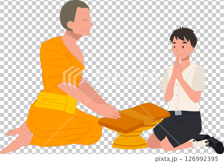 A Thai student boy offers a bathing robe to a monk during Buddhist Lent 126992395