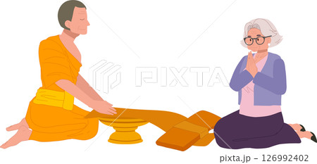 thai buddhist tradition elderly woman offering robe to monk on buddhist lent day thai buddhist tradition elderly woman offering robe to monk on buddhist lent day 126992402