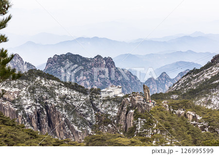 Flying Rock formation peak at Huangshan or Yellow Mountain, popular tourism landmark in China 126995599