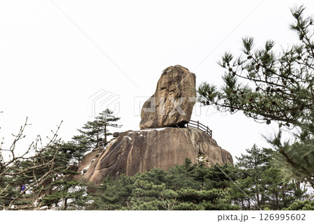 Flying Rock formation peak at Huangshan or Yellow Mountain, popular tourism landmark in China 126995602
