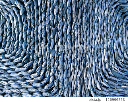 A fragment of a woven straw texture. Abstract background 126996838