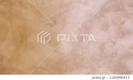 a close up view of an elegant textured marble wall surface with a subtle, warm beige tone. a close up view of an elegant textured marble wall surface with a subtle, warm beige tone. 126996913