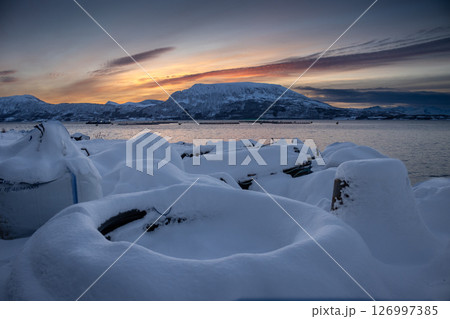 Industrial place with snow during sunset, Norway Industrial place with snow during sunset, Norway 126997385