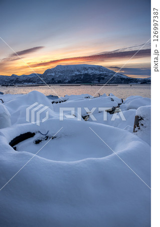 Industrial place with snow during sunset, Norway 126997387