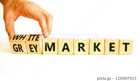 Grey or white market symbol. Concept words Grey market or White market on beautiful wooden blocks. Beautiful white background. Businessman hand. Business grey or white market concept. Copy space. 126997923