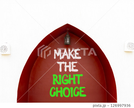 Make the right choice symbol. Concept words phrase Make the right choice on beautiful brown wall. Beautiful white wall background. Business Make the right choice concept. Copy space. 126997936