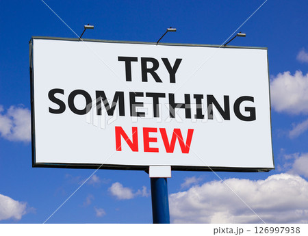 Try something new symbol. Concept words Try something new on beautiful big white billboard. Beautiful blue sky clouds background. Business motivational lifestyle try something new concept. Copy space. Try something new symbol. Concept words Try something new on beautiful big white billboard. Beautiful blue sky clouds background. Business motivational lifestyle try something new concept. Copy space. 126997938