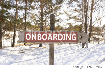 Onboarding success symbol. Concept word Onboarding on wooden road sign. Beautiful winter forest background. Business onboarding success concept. Copy space. Onboarding success symbol. Concept word Onboarding on wooden road sign. Beautiful winter forest background. Business onboarding success concept. Copy space. 126997987