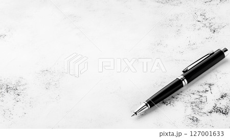Elegant black pen on marble background for professional stationery design 127001633