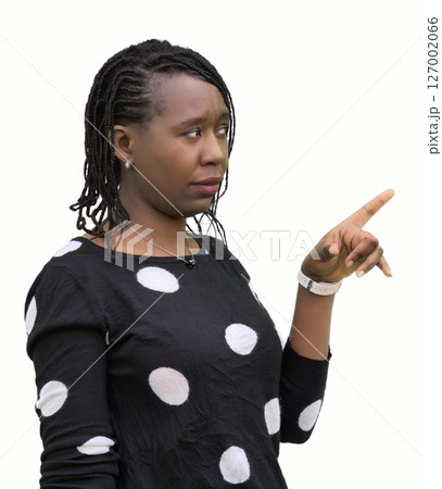 Wondering African Woman Pointing with Uncertain Expression Isolated on White 127002066
