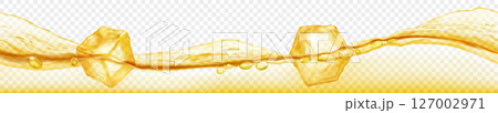 Ice cubes floating in water, in yellow colors. 127002971