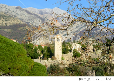 Picturesque view of Clock Tower in Old Town Bar (Stari Grad Bar) on the background of majestic Balkans mountains in Montenegro 127004188
