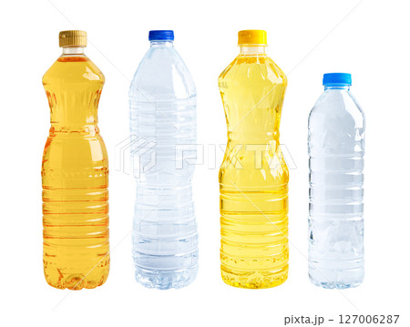 Vegetable oil and water in bottle isolated on white background. 127006287