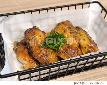 Close up of Chicken Wings in Basket. Close up of Chicken Wings in Basket. 127006382