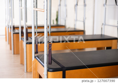 Closeup view of Pilates trapeze table for fitnes and rehabilitation exercises 127007390