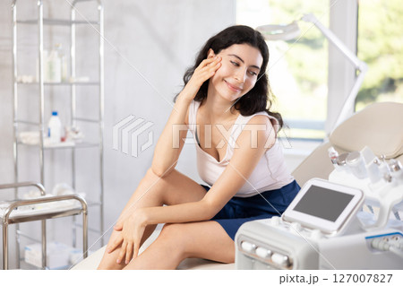 Brunette woman ready for plastic surgery on her face 127007827