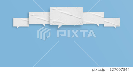 White speech bubble crumpled paper isolated on light blue background White speech bubble crumpled paper isolated on light blue background 127007844