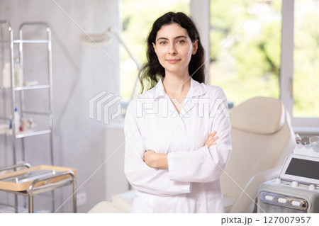 her professional demeanor and inviting smile her professional demeanor and inviting smile 127007957