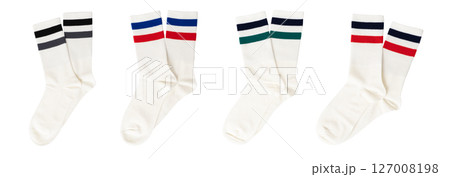 Collection of white tube socks with colorful stripes on white background 127008198