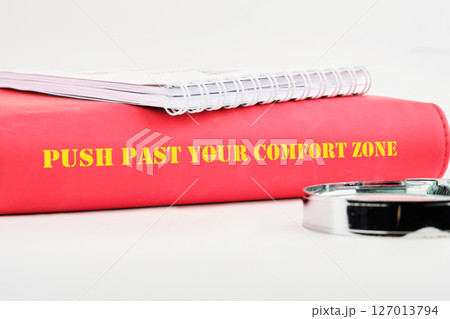 Familiarity, habits, discovering, challenge, uncertainty concept. Words PUSH PAST YOUR COMFORT ZONE Familiarity, habits, discovering, challenge, uncertainty concept. Words PUSH PAST YOUR COMFORT ZONE 127013794