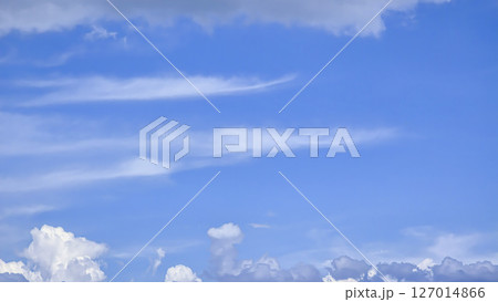 Blue sky with voluminous fluffy clouds. Thunderstorm over the river. Blue sky with voluminous fluffy clouds. Thunderstorm over the river. 127014866